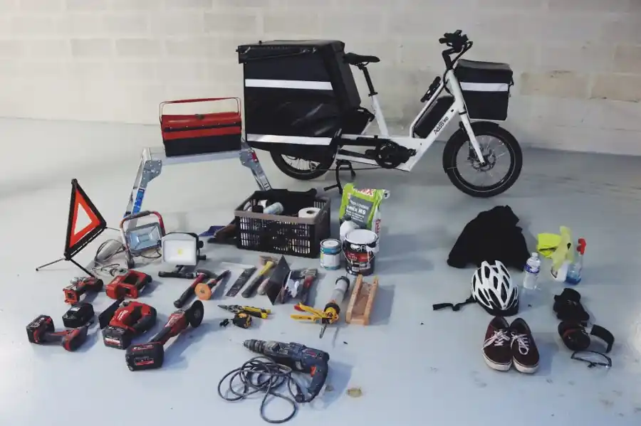 <br />
Bike with cargo box capability shown by objects laid on the ground